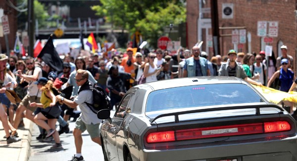 Murder charge after automobile hits counter-demo crowd at white supremacist rally